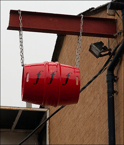 Red 'fff' Cask hanging outside the Brewery Shop