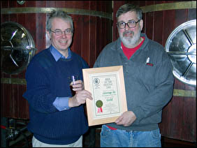 Steve Brown and Tom Madeiros accept award