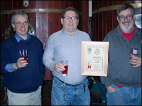 Brian Kirton present the award to the MD and Head Brewer - Feb 2006