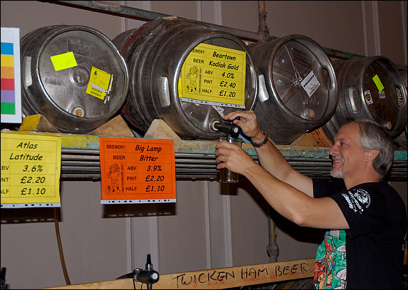 Beer being drawn from cask into glass