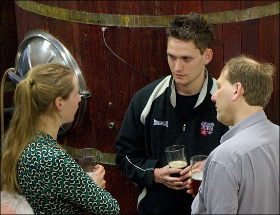 Helma talking to two members