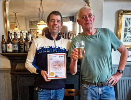 Award presentation in the Mitre May 2026 Award presentation in the Mitre May 2026