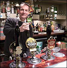 Crispin Mallet pulling a pint