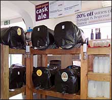 Casks on stillage in shop